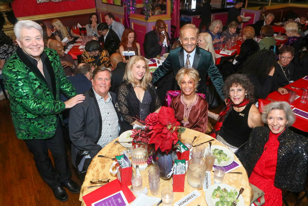 Host Richard Skipper, Tony Waag, Mary McCatty, DO40 prez John	Sefakis, Mercedes Elllington, Sue Samuels and Susan Sigrist at the honorees table